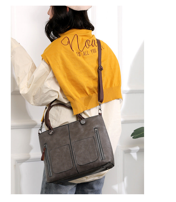 Vintage leren schoudertas voor vrouwen met verstelbare riem en ruim ontwerp