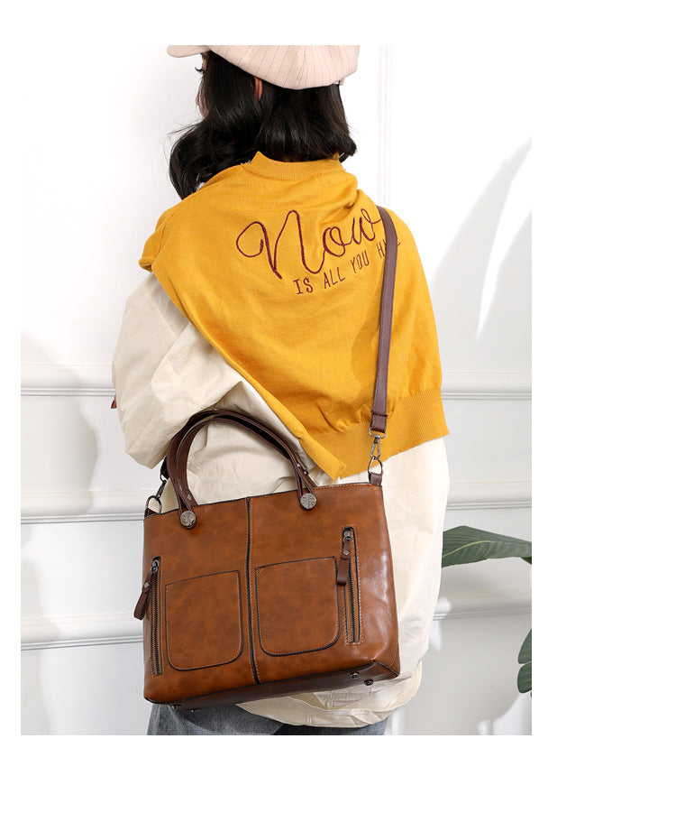 Vintage leren schoudertas voor vrouwen met verstelbare riem en ruim ontwerp
