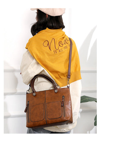 Vintage leren schoudertas voor vrouwen met verstelbare riem en ruim ontwerp
