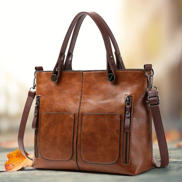 Vintage leren schoudertas voor vrouwen met verstelbare riem en ruim ontwerp