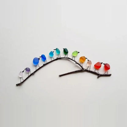 Kleurrijke vogel wanddecoratie gerecyclede zeeglas vogels op tak