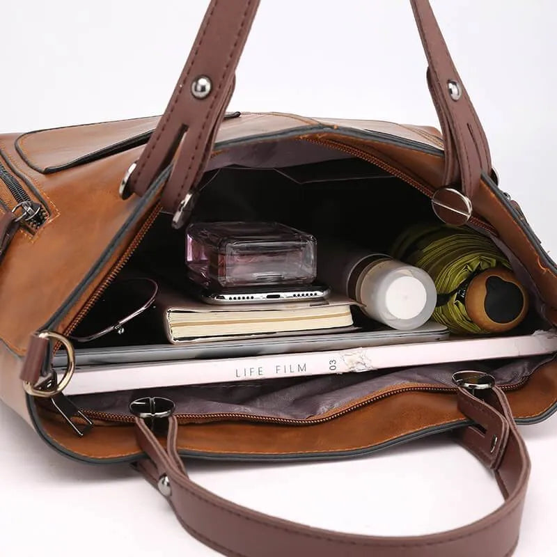 Elly vintage leren schoudertas voor dames met elegant handgemaakt ontwerp