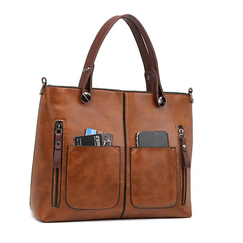 Elly vintage leren schoudertas voor dames met elegant handgemaakt ontwerp