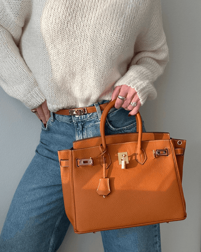 Leren handtas voor dames met verstelbare riem en ruim ontwerp