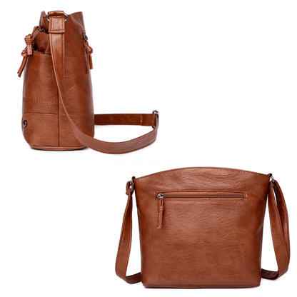 Toli vintage leren schoudertas met ruim en georganiseerd ontwerp